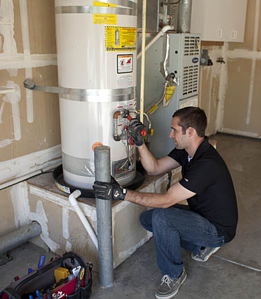 Plumber in Hayward fixes a water heater